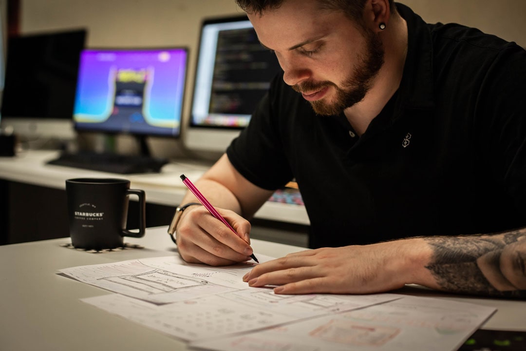 An image of Gav creating a logo.