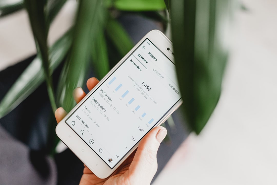 An image of analytics displayed on a mobile phone.