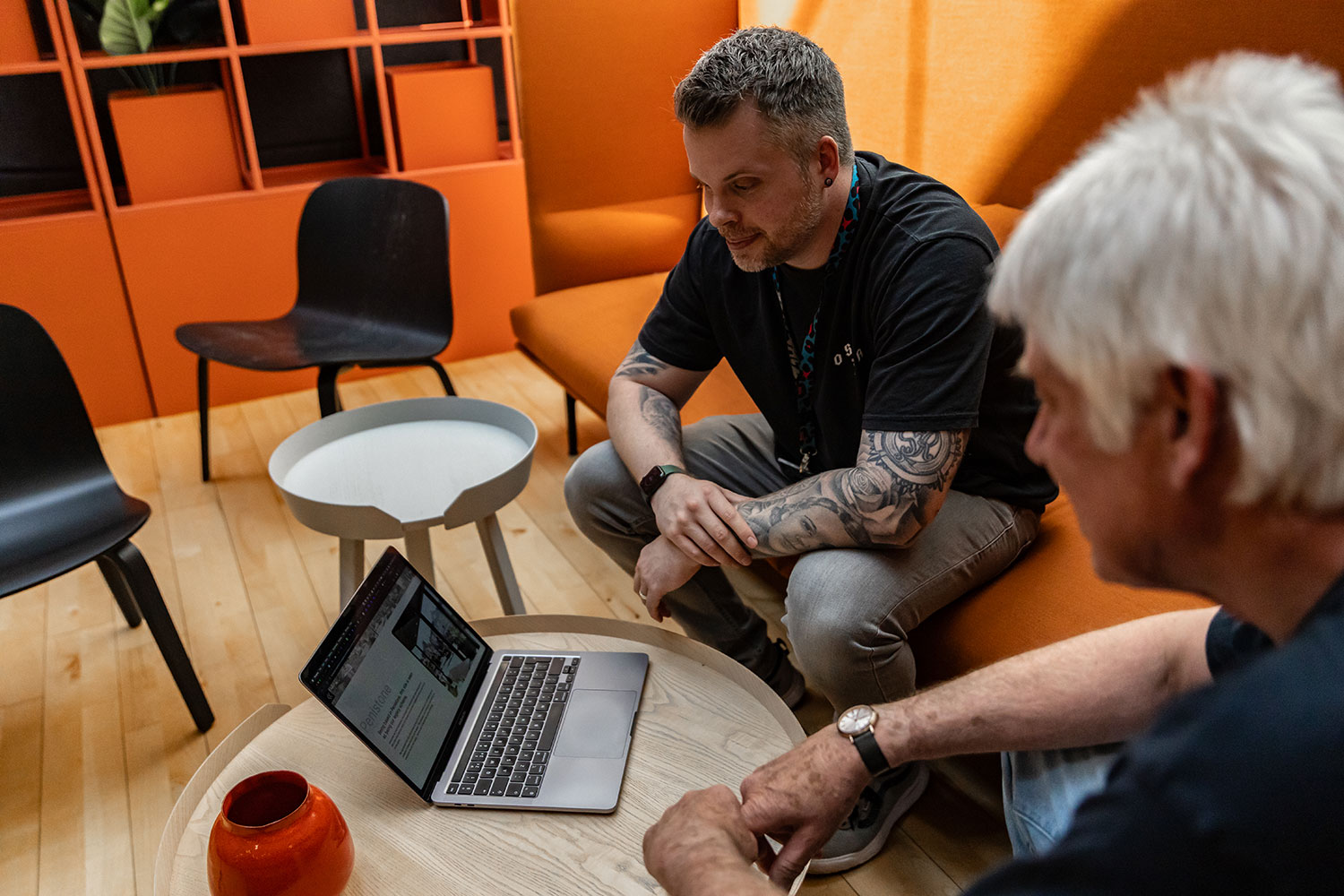 An image of the BurstingBox team checking Google Ads with a client.