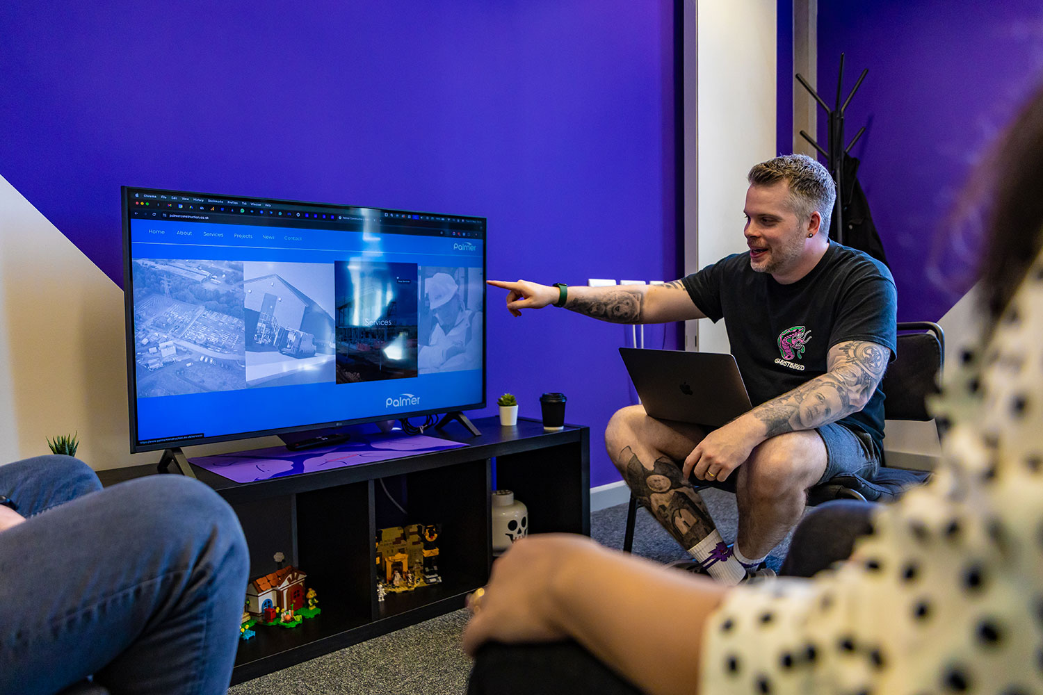 An image of our team discussing client feedback.